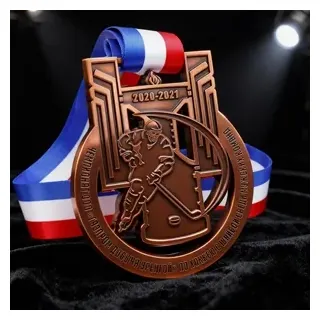Copper-plated medal for ice hockey competition
